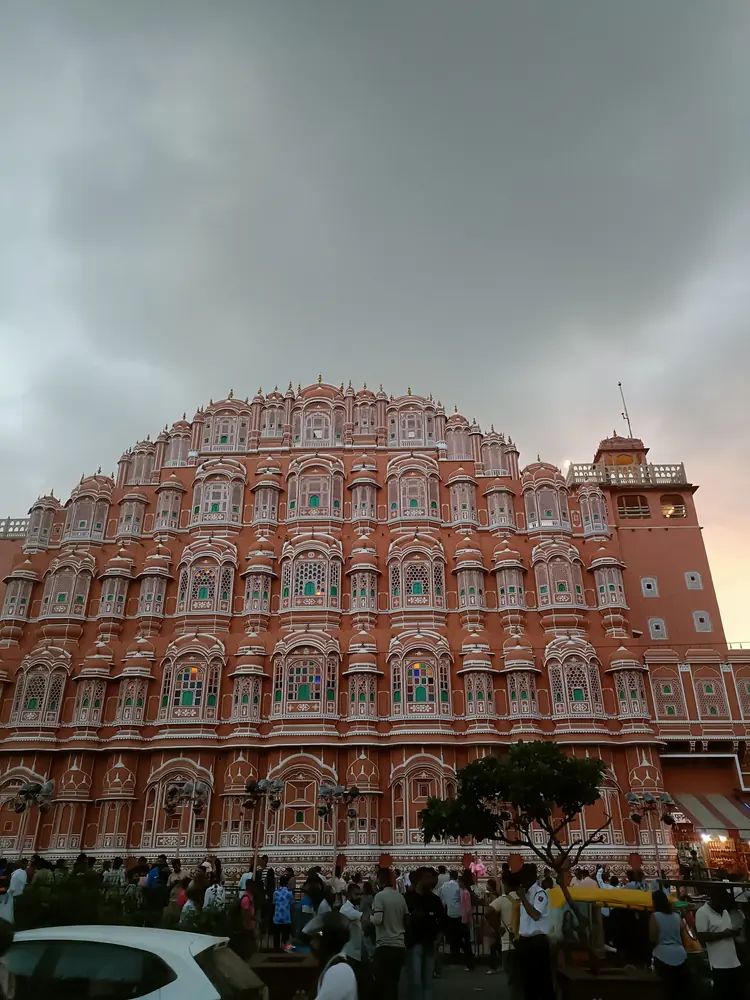 Hawa Mahal in Jaipur beneath a gathering monsoon sky